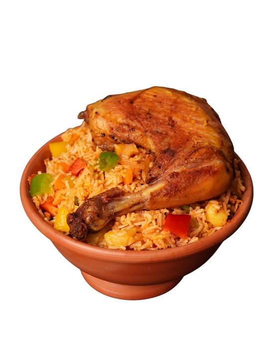 Chicken Nasi Masala — clay bowl of spiced rice topped with roast chicken